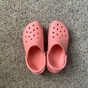 Pink crocs